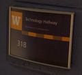 Close-up of sign next to the door into the Technology Hallway.